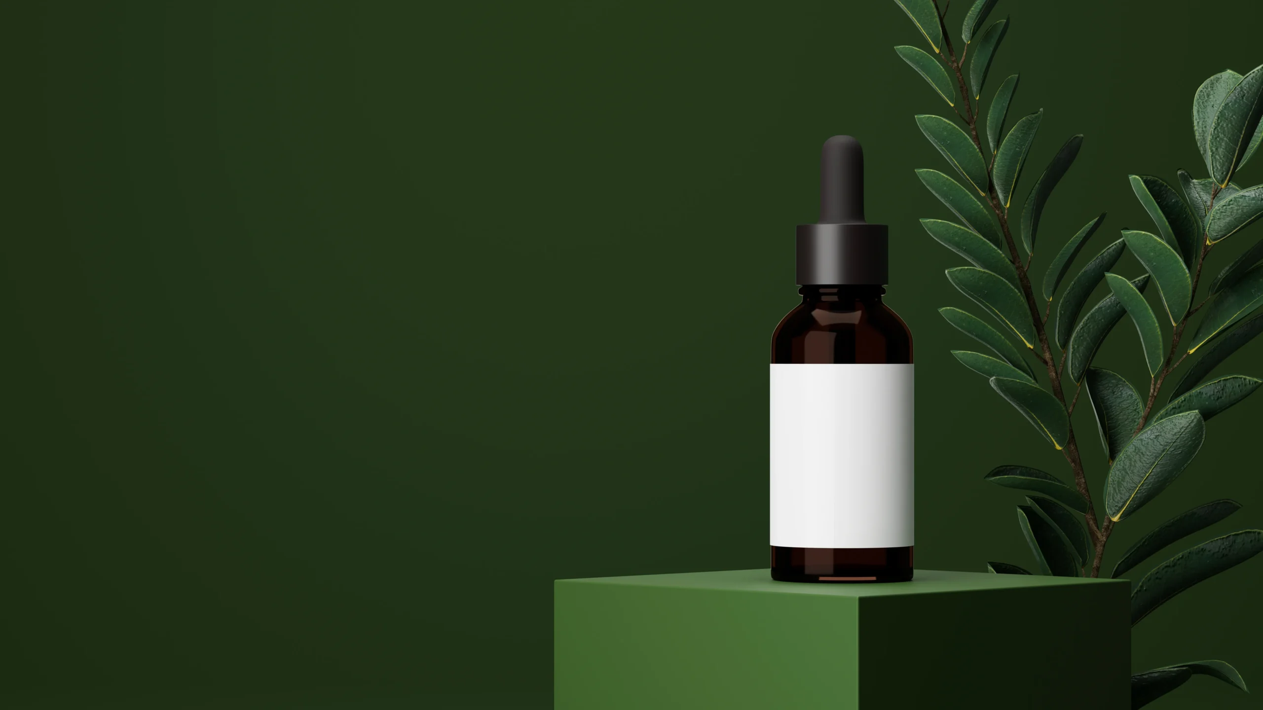 OEM TH Amber glass cosmetic dropper bottle with blank white label standing on a green podium beside leafy foliage for organic skincare manufacturing.