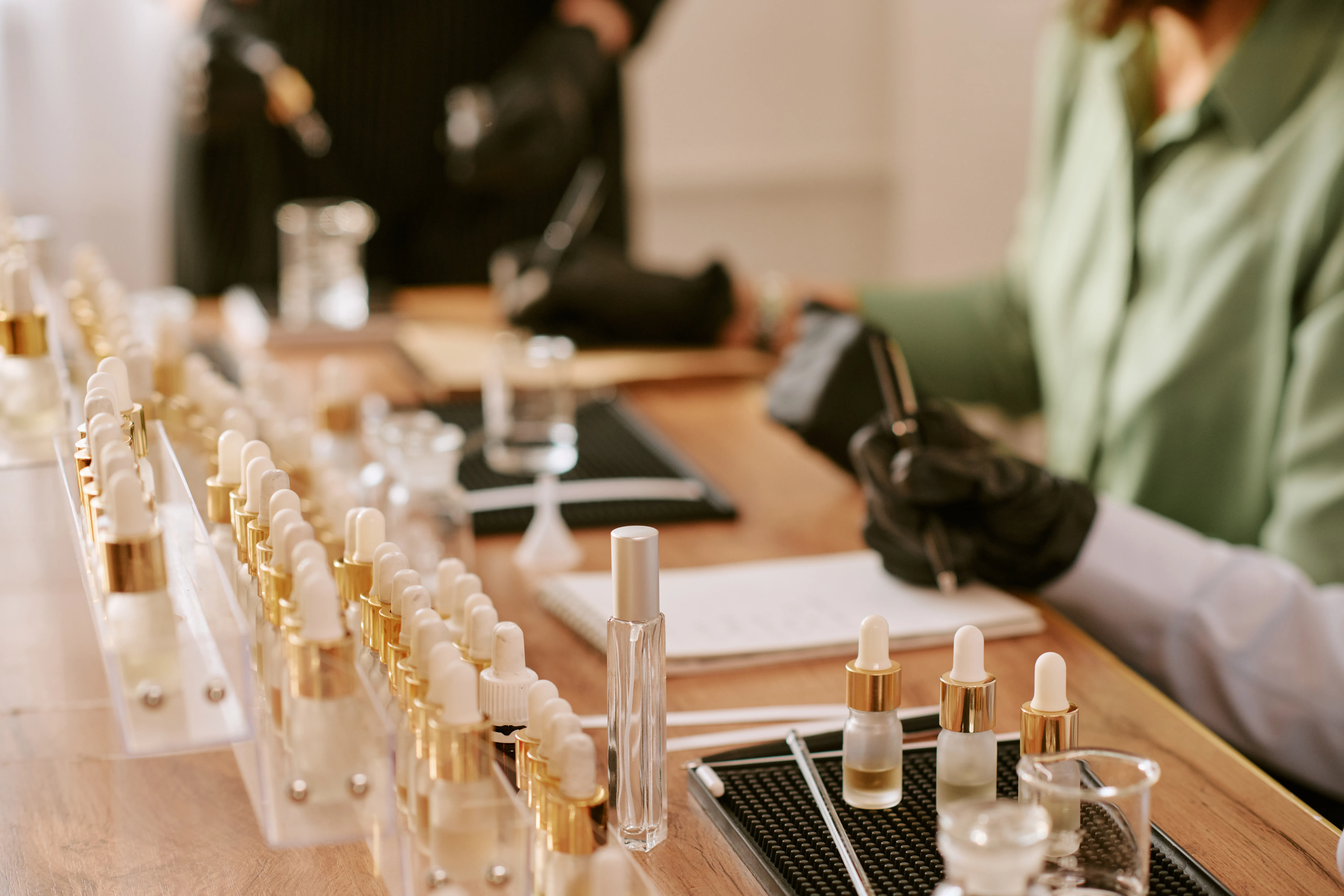 R&D team members developing and testing cosmetic extract formulas for OEM and ODM skincare and supplement manufacturing services by a world-class standard factory.